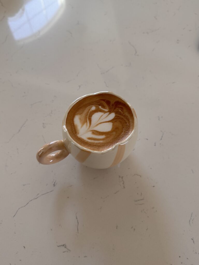 hot latte in a handmade mug from Mexico 