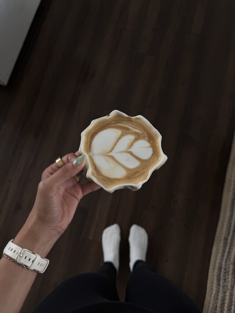 hot latte in a handmade ceramic mug 