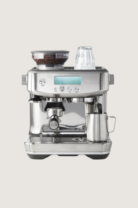 Breville Barista Pro espresso machine on a beige background